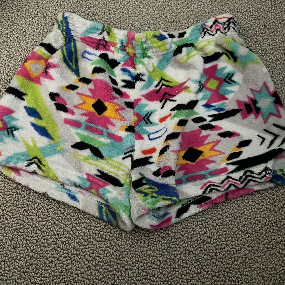 Kids pajamas shorts with a pocket in the back. Size medium 10/12